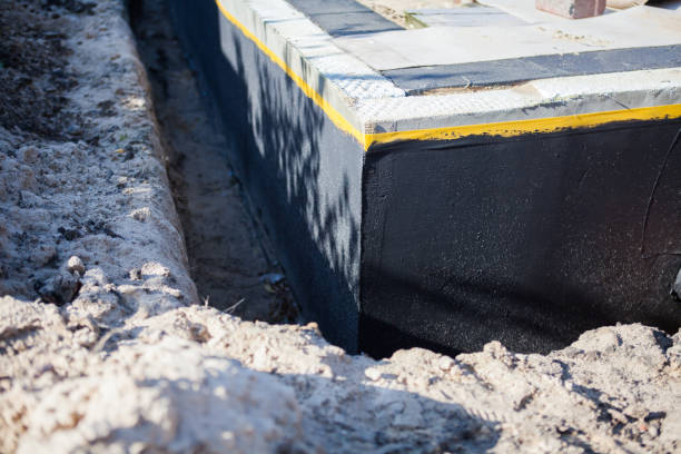 Professional Emergency Waterproofing technician working in Goshen, OH